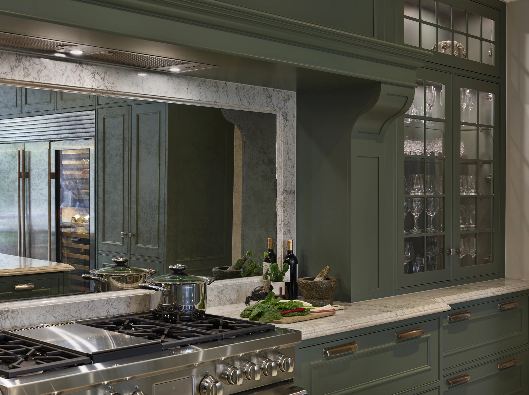 Green classic englemere kitchen with antique mirror splash back