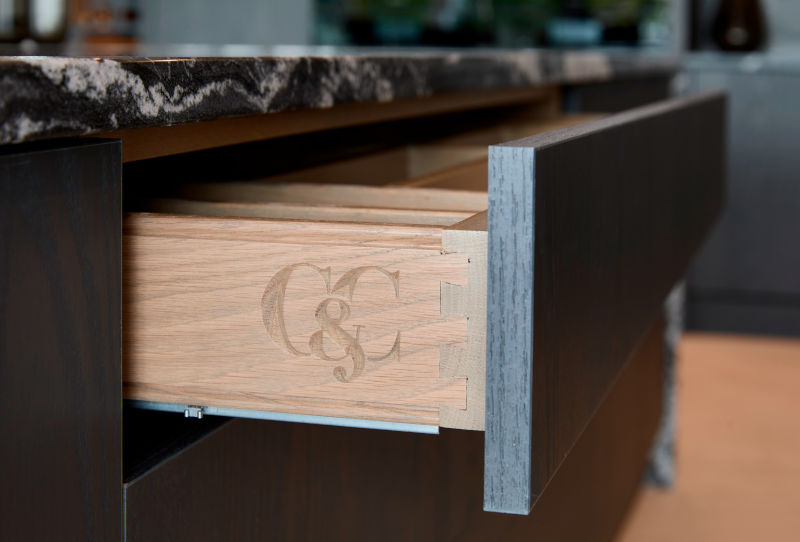 Bespoke Cabinets and drawers this one has the cooks and company logo etched in the woodwork